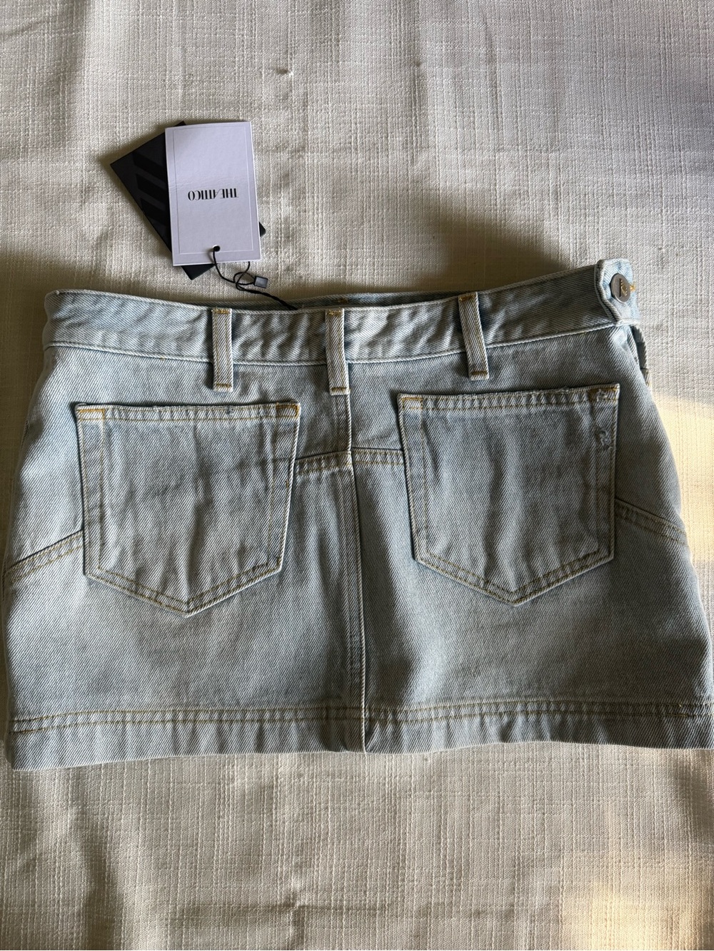 The Attico light blue denim mini skirt